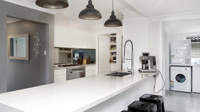 The kitchen is the centre of the house, with its six burner gas cooktop and oven.