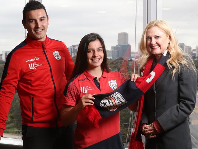 21/08/17 Adelaide United women's team coach Ivan Karlovic, player Alex Chidiac and SA Power Networks General Manager Customer Relations Sue-Ann Charlton at the SA Power Networks building in Keswick. SA Power Networks will sponsor the Lady Reds next season. photo Calum Robertson