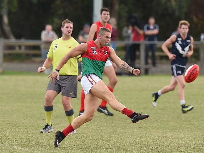 Peninsula FNL: Edi-Aspendale v Pines at Regents Park, Aspendale. Pines #31 Lachlan Pizzey boots the pythons into attack. Picture: Chris Eastman