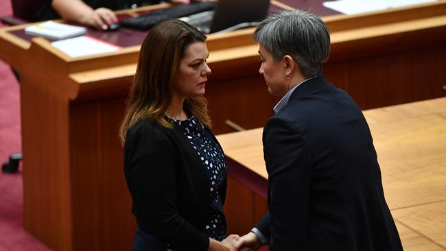 Greens Senator Sarah Hanson-Young with Labor Seator Penny Wong.