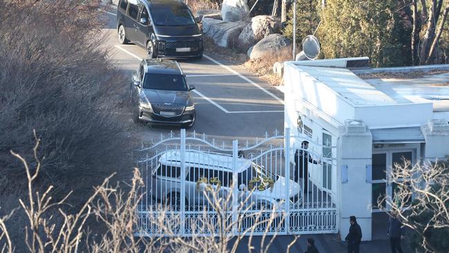 A vehicle from the security service of South Korea's impeached President Yoon Suk Yeol blocks an entrance gate at the presidential residence in Seoul. Picture: Yonhap/AFP