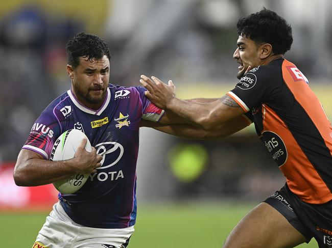 Peta Hiku of the Cowboys is tackled during the round 19 NRL match against the Tigers. Picture: Getty Images