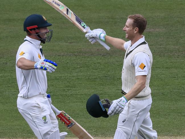 Adam Voges, right, celebrates his double century with Shaun Marsh during the 2015 Test against a hapless West Indies. Picture: AAP/Rob Blakers