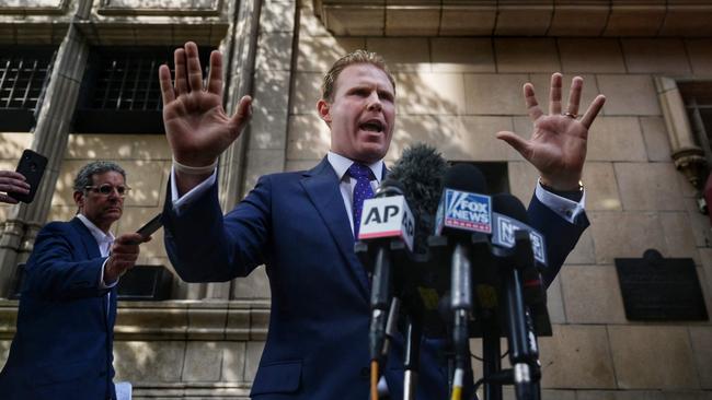 Andrew Giuliani, Rudy Giuliani’s son, speaks to the press outside his father's apartment building in New York. Picture: AFP