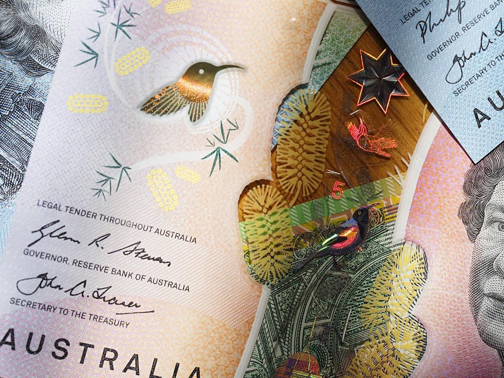 Australian five, ten and fifty dollar bills in a panoramic format with image distortion. The new issue is designed to deter counterfeiting, the note is polymer and water resistant. generic money