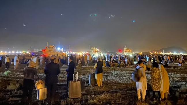 Afghanistan's airport as people flood the runway. Picture: Twitter