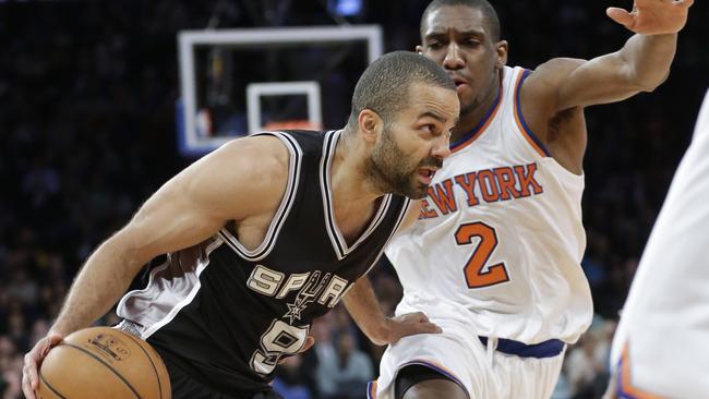 New York Knicks' Langston Galloway defends San Antonio Spurs' Tony Parker.