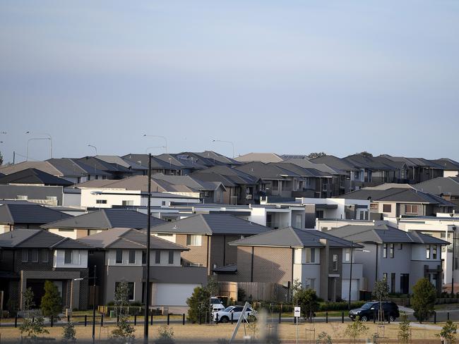 Residential housing is seen in Sydney's west, Thursday, July 26, 2018. Tumbling house prices in Sydney and Melbourne are the main drivers behind the first annual drop in national property prices in six years, a new report shows. (AAP Image/Dan Himbrechts) NO ARCHIVING