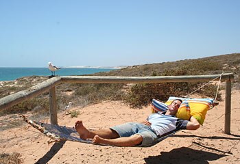 Catching some zzzz's ... Red Bluff may be "Australia's most famous secret spot" but when the hammock calls ... Picture: Emma Siossian