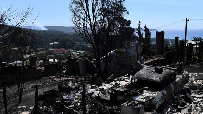 More than 70 houses and businesses were destroyed in the coastal town of Tathra. Picture: AAP