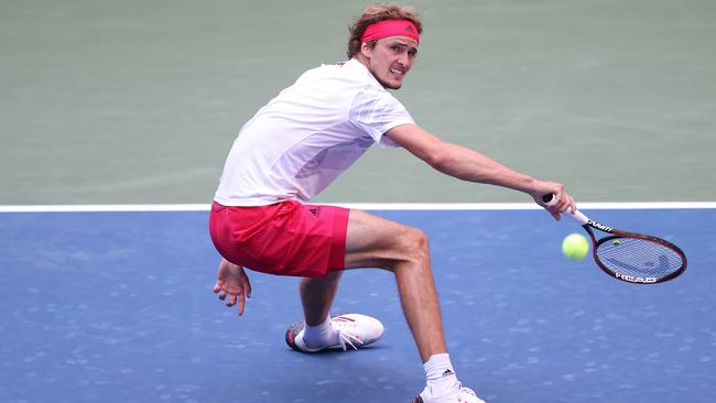 Germany’s Alexander Zverev stretches for a return against Borna Coric in the quarter-finals of the US Open. Picture: Getty Images