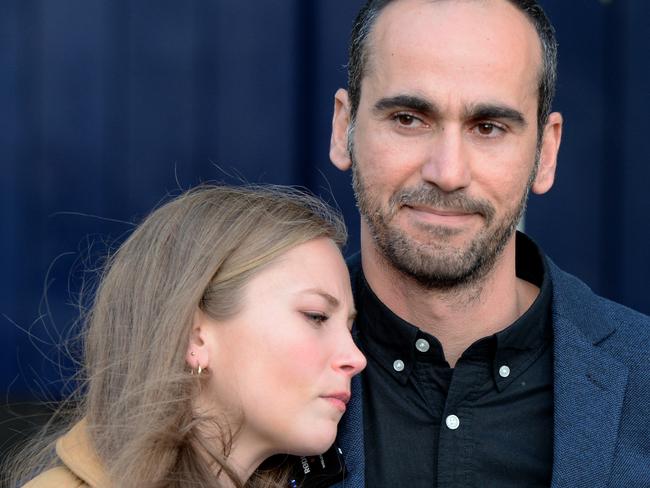 MELBOURNE, AUSTRALIA - NewsWire Photos JULY 6, 2023: Grace Tame, former Australian of the Year, and Kurdish-Iranian refugee Mostafa "Moz" Azimitabar outside the Federal Court in Melbourne. Picture: NCA NewsWire / Andrew Henshaw