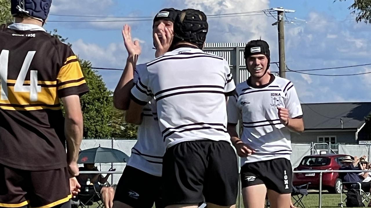 Iona celebrate a Second XV try on the way to winning.