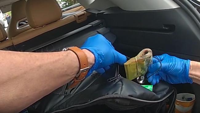 Police allegedly found cash, bleach, hacksaw blades, plastic sheeting, a blowtorch and other items in their car. Picture: Queensland Police.