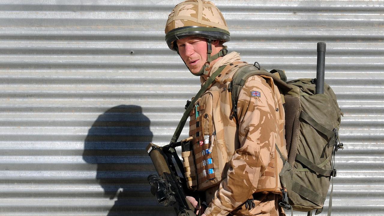 Prince Harry on patrol through the deserted town of Garmisir.