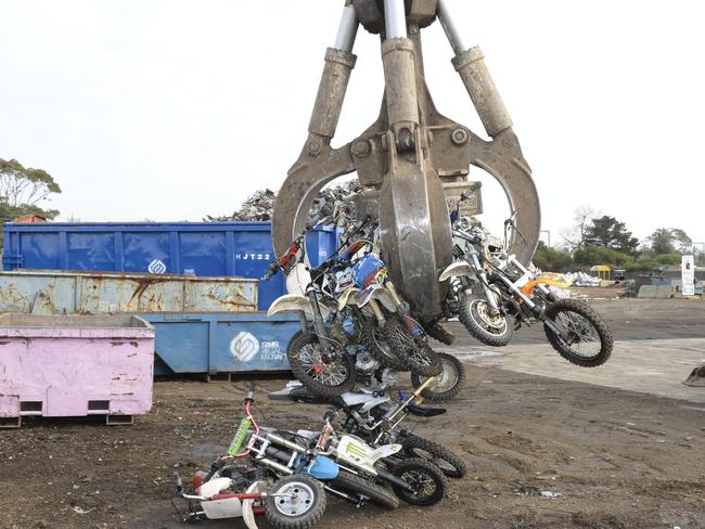 Monkey bike crushing  at Sims Metal in Seaford.   The bikes are lined up then  crushed by a magnetic grab. Picture: Lawrence Pinder