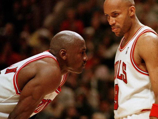 7 Jun 1996: Michael Jordan of the Chicago Bull, left, discusses strategy with teammates Ron Harper, center, and Scottie Pippen during a time-out on the court during the fourth quarter of game two in the NBA Finals at the United Center in Chicago, Illino