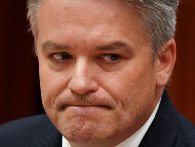 Minister for Finance Senator Mathias Cormann after announcing the government cannot pass the company tax cut bill in the Senate chamber at Parliament House in Canberra, Tuesday, March 27, 2018. (AAP Image/Mick Tsikas) NO ARCHIVING