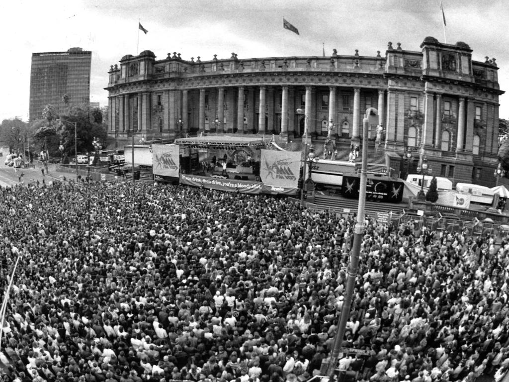 1991. The crowd of 12,000 brought Spring Street to a standstill as they listen to Noisework play on a stage erected on the steps of Parliament House.