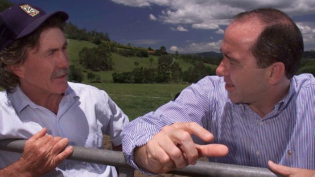 The then opposition leader Rob Borbidge with dairy farmer Grant Currey at his property Coomera in 2001.