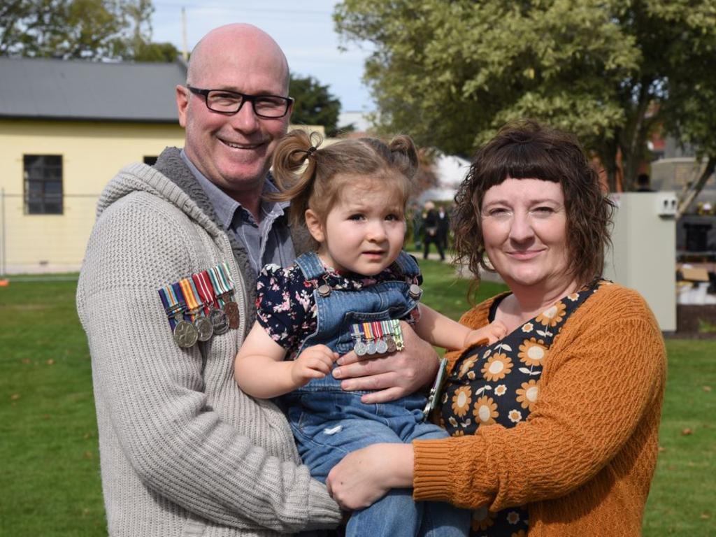 Launceston man Cameron Johnson with his partner Sarah and their daughter at the Longford Anzac Day service, April 25, 2023. Picture: Alex Treacy