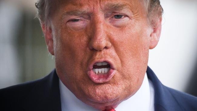 (FILES) In this file photo US President Donald Trump speaks to the press before departing the White House  on June 20, 2020 in Washington, DC, for a campaign rally in Tulsa, Oklahoma. - One of Donald Trump's brothers requested a restraining order to block publication of a potentially explosive book written by the US president's niece, The New York Times reported June 23, 2020. Mary Trump will release her no-holds-barred memoir "Too Much and Never Enough: How My Family Created the World's Most Dangerous Man," on July 28, according to publishing house Simon & Schuster. (Photo by Eric BARADAT / AFP)