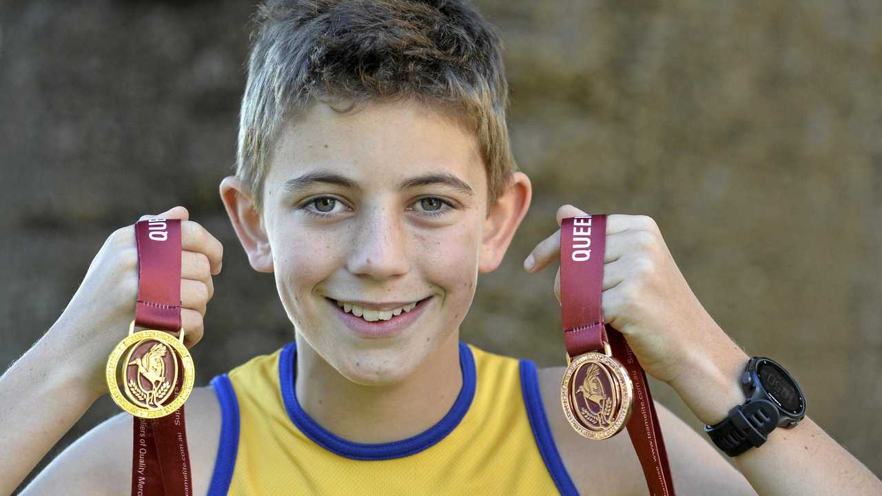 GOLDEN MOMENT: Toowoomba Grammar School student Charlie Randall defended his under-12 cross-country title at the Queensland championships. He also captained the Darling Downs relay team to third place at the championships. Picture: Kevin Farmer