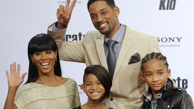 On a 2010 red carpet with children Willow and Jaden, who are both now all grown up. Picture: AP