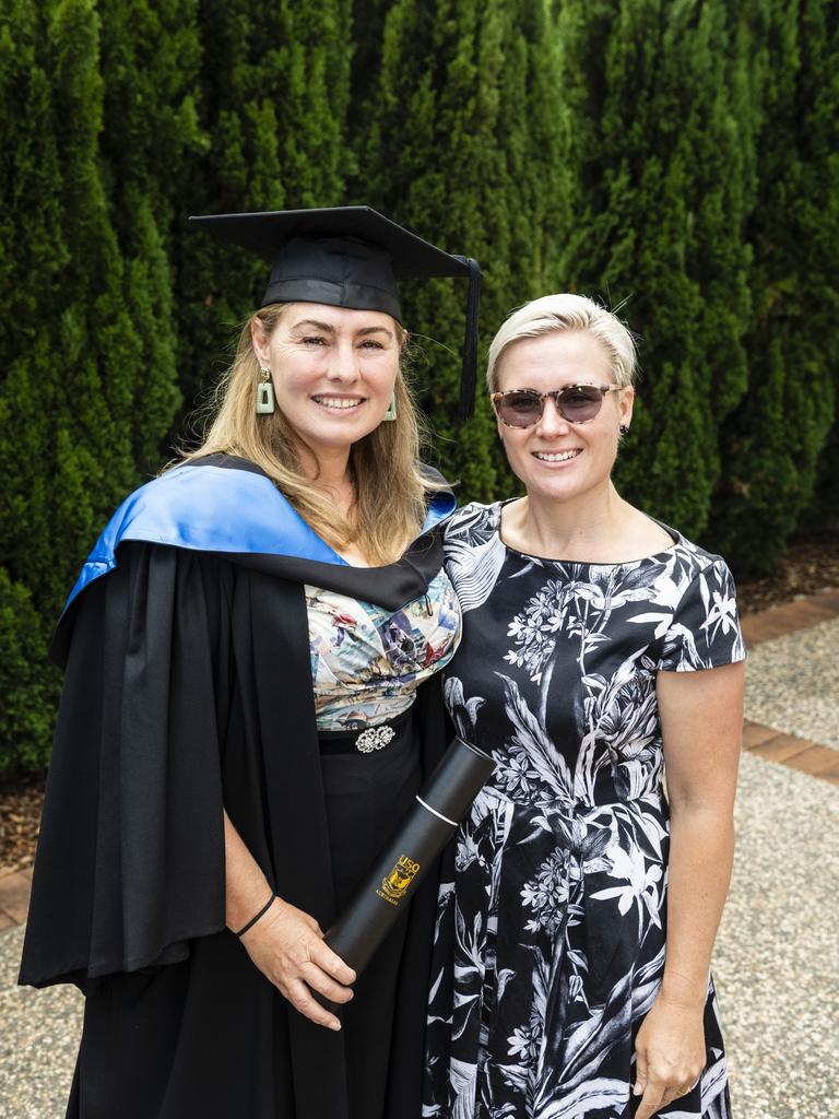 Bachelor of Psychology (Honours) graduate Cherylin Buttle with Joaleen Headridge at the UniSQ graduation ceremony at Empire Theatres, Tuesday, December 13, 2022. Picture: Kevin Farmer