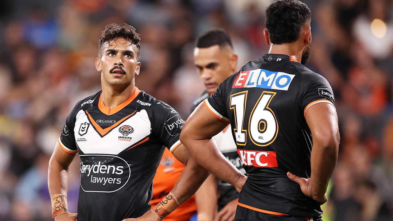 SYDNEY, AUSTRALIA - MARCH 12: Daine Laurie of the Tigers looks dejected after a try during the round one NRL match between the Wests Tigers and the Melbourne Storm at CommBank Stadium, on March 12, 2022, in Sydney, Australia. (Photo by Mark Kolbe/Getty Images)