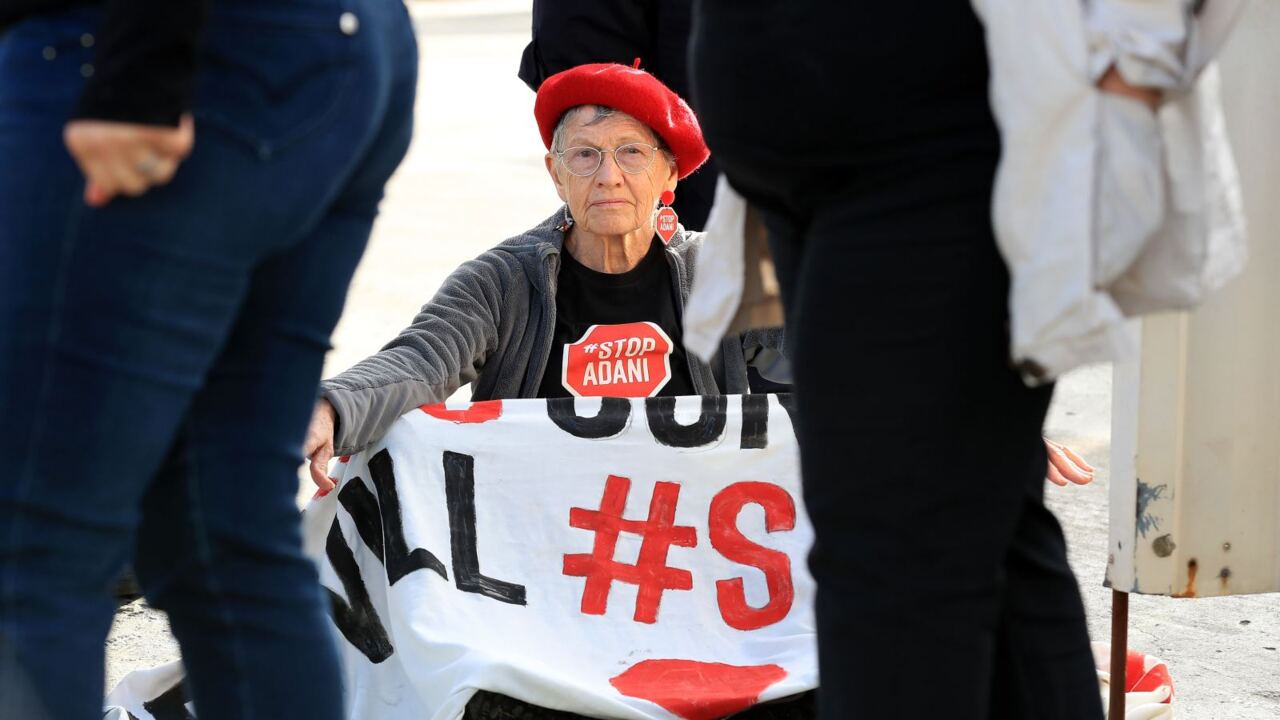 Anti-Adani activists removed from Brisbane protest