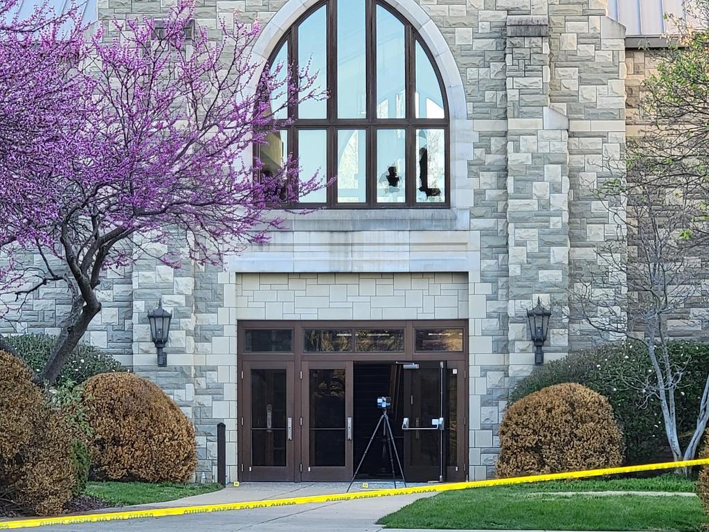 This image released by the Metro Nashville Police Department shows the second story broken windows the shooter fired from on arriving police vehicles. Picture: Metro Nashville Police Department / AFP