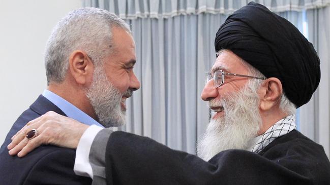 Iran’s supreme leader Ayatollah Ali Khamenei greets Hamas prime minister of Gaza Ismail Haniyeh, in Tehran, Iran, in 2012.