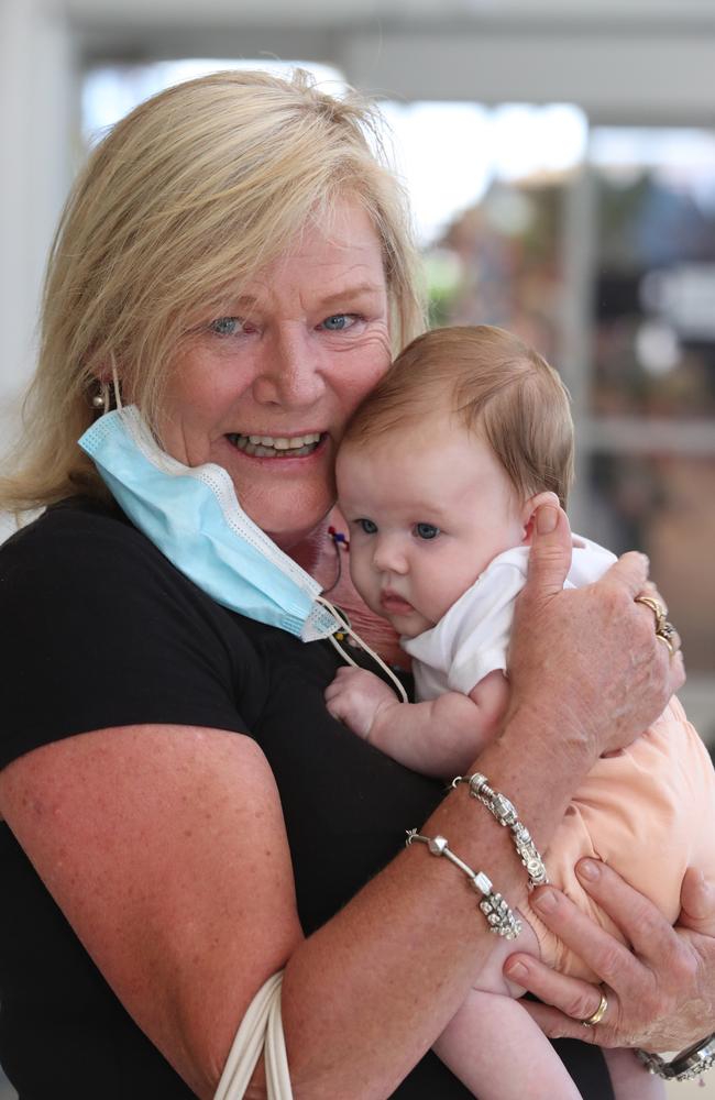 Jill Coomber arrives to hug her baby granddaughter, 10 week old Addison Wilkeson, for the first time. Picture Glenn Hampson