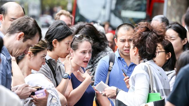 Neo200 residents wait to gain access back to the building. Picture: Tim Carrafa