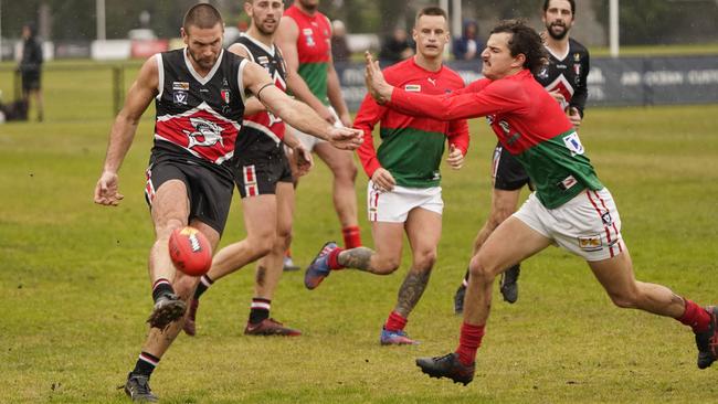 MPNFL: Bonbeach’s Matthew Douglas gets his kick away. Picture: Valeriu Campan