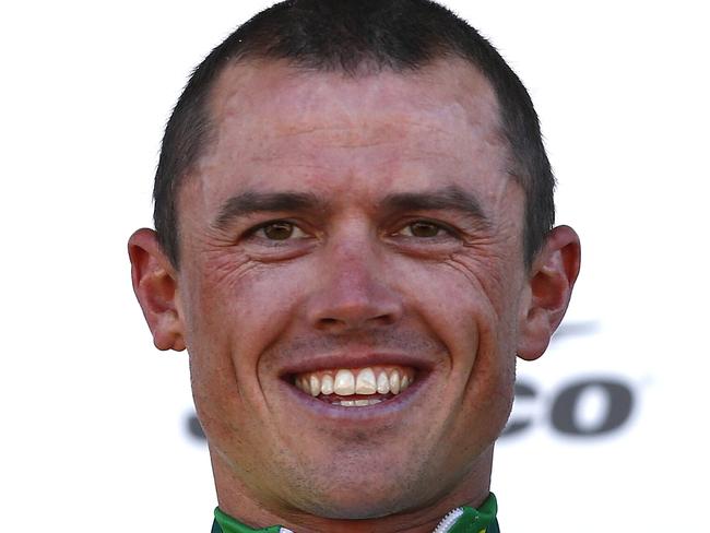 Simon Gerrans on the podium after his win today over Cadel Evans and Richie Porte. Pic Michael Klein