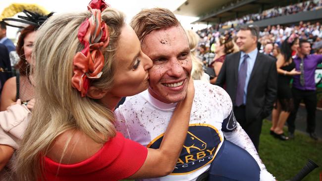 Ben Melham is congratulated by partner Karlie Dales after winning the 2017 Golden Slipper.