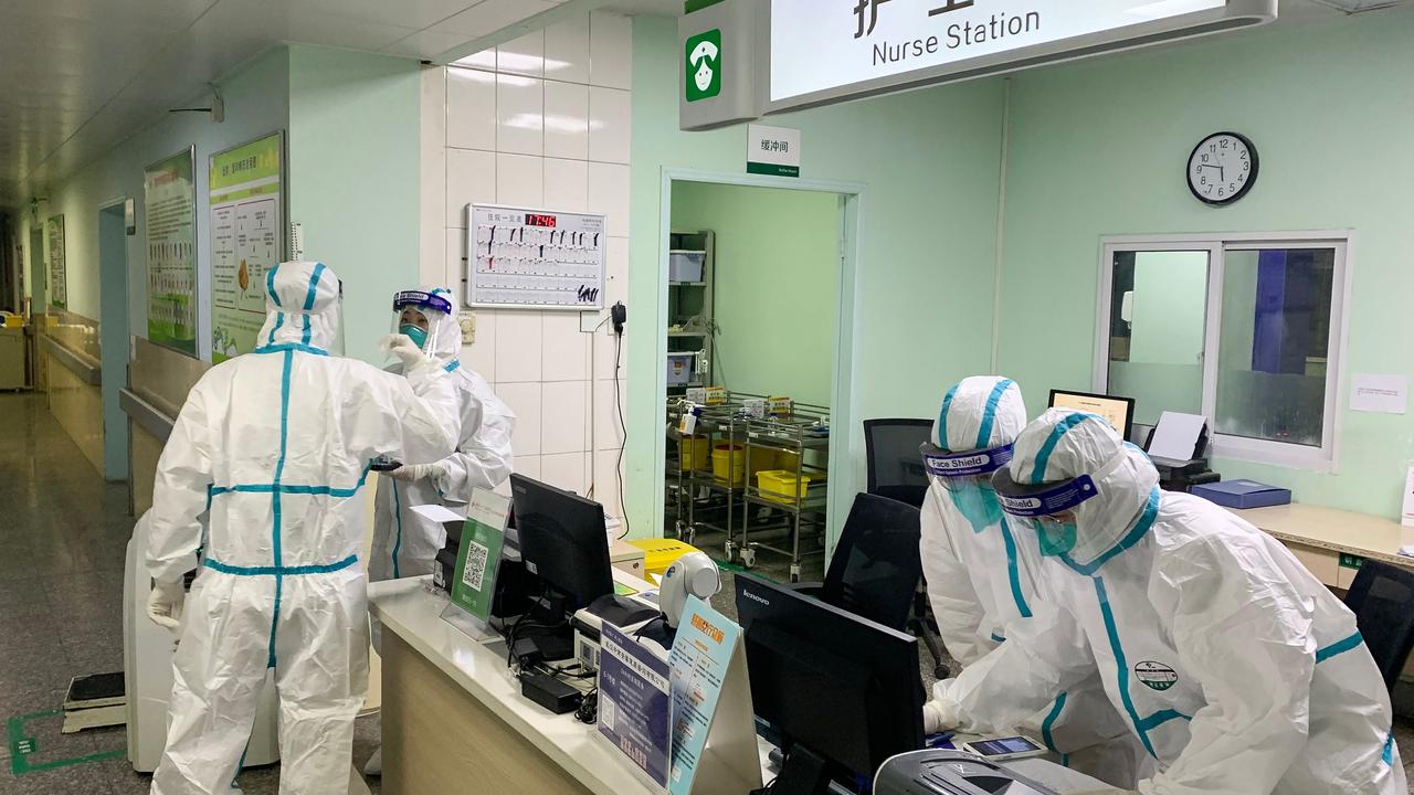 Medical staff members wearing protective suits at the Zhongnan hospital in Wuhan. Picture: STR AFP