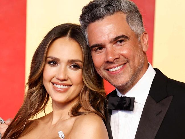 Actress Jessica Alba and husband, film producer Cash Warren, attend the Vanity Fair Oscars Party at the Wallis Annenberg Center for the Performing Arts in Beverly Hills, California, on March 10, 2024. (Photo by Michael TRAN / AFP)