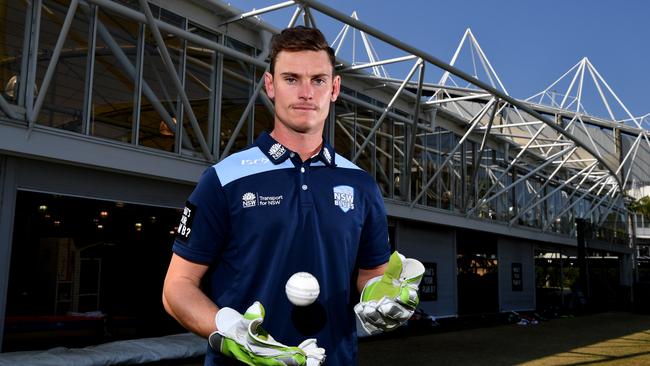 Cricketer Jay Lenton poses for a photo at the Sydney Cricket Ground (AAP Image/Joel Carrett)