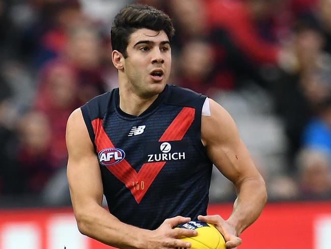 Christian Petracca of the Demons is seen in action during the Round 23 AFL match between the Melbourne Demons and the Greater Western Sydney (GWS) Giants at the MCG in Melbourne, Sunday, August 26, 2018. (AAP Image/Julian Smith) NO ARCHIVING, EDITORIAL USE ONLY