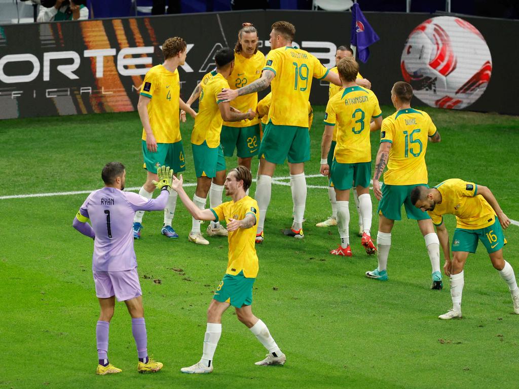 Australia's players celebrate Craig Goodwin’s goal against South Korea. Picture: AFP