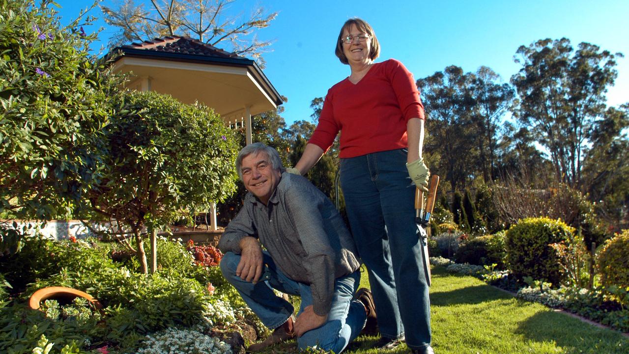 Arch Roggeveen and Julie Roggeveen at work in the early morning in the maintenance phase of their preparation for the Carnival of Flowers Competition. Picture: David Martinelli.