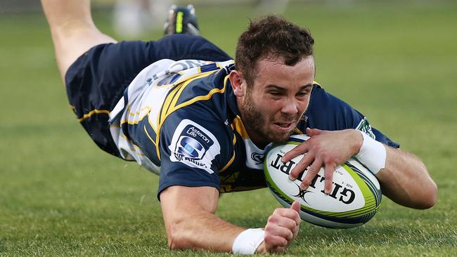 Robbie Coleman scores the opening try for the Brumbies.