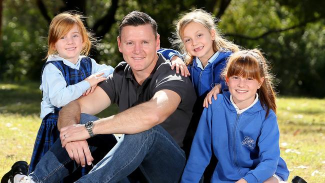 Former Wallaby Matthew Burke and his daughters (l-r) Zsa Zsa 5, Giselle 6, and Edie 12 back in 2016.