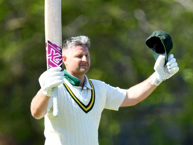 Michael Hill of Yarraville Club celebrates making a century during the Victorian Turf Cricket Association match between Yarraville Club and St Albans at Hansen Reserve, on October 12, 2024, in Melbourne, Australia. (Photo by Josh Chadwick)