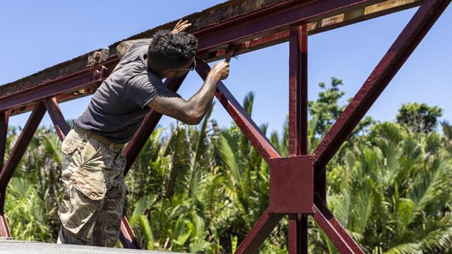 Soldiers from 3rd Combat Engineer Regiment refurbish facilities as part of Exercise Puk Puk at Moem Barracks, Papua New Guinea. PHOTO: LCPL Riley Blennerhassett