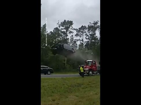 Car Goes Airborne After Hitting Tow Truck Ramp 