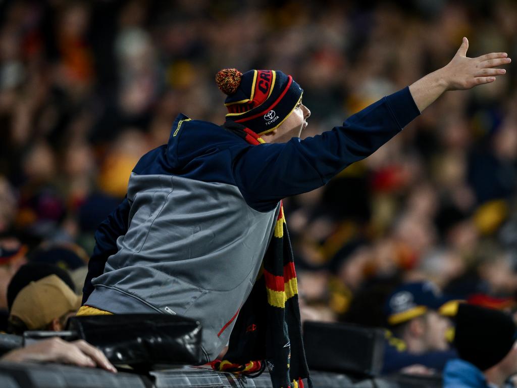 Crows fans were far more vocal in their opposition to the non-call of a free kick which cost them a shot on goal after the siren to win the game than the club was. Picture: Mark Brake/Getty Images.